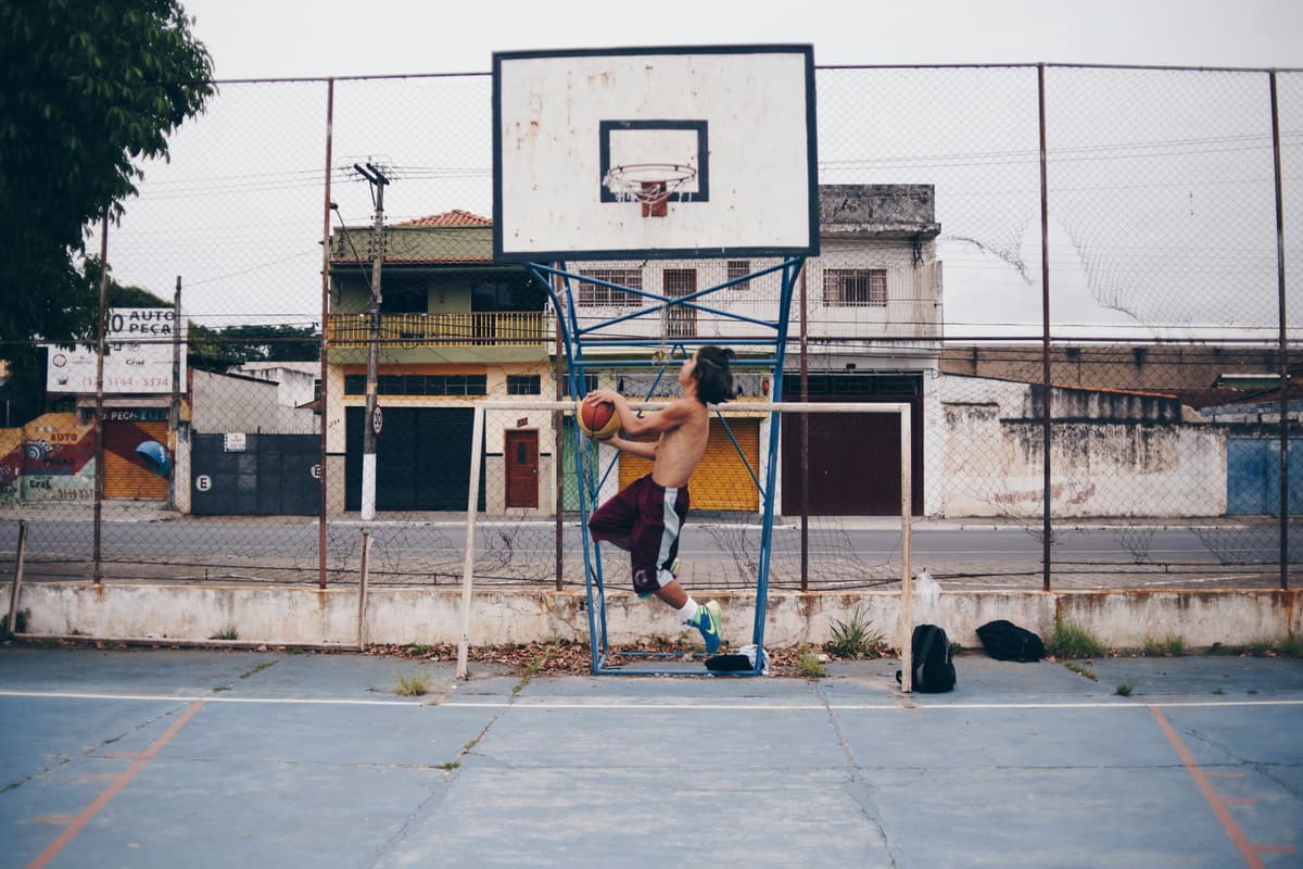 Person playing basketball at summer camp