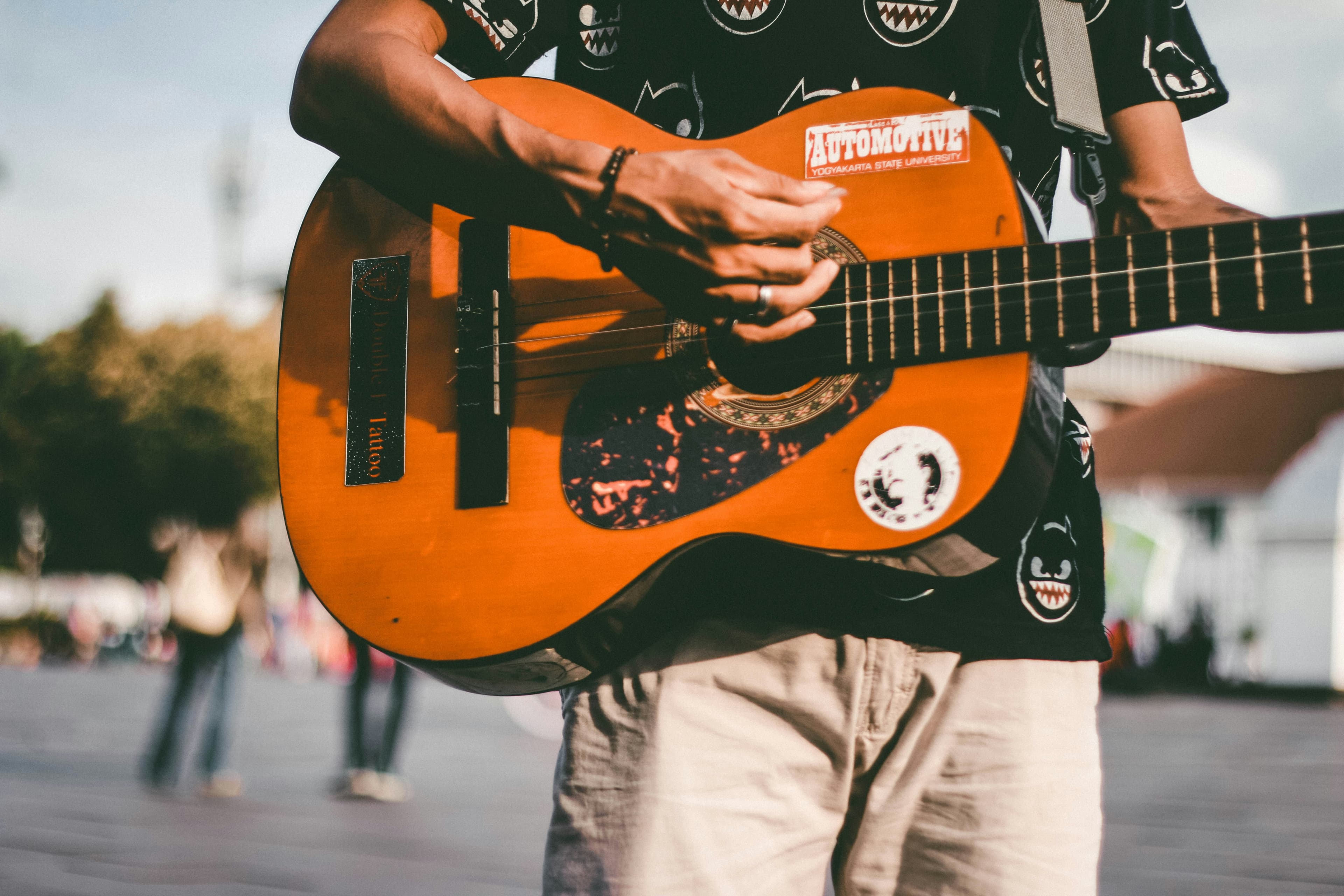 Person playing guitar