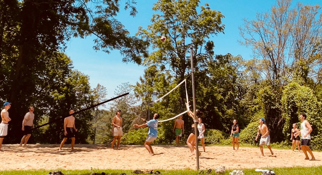 Beach volleyball at a lakeside camp