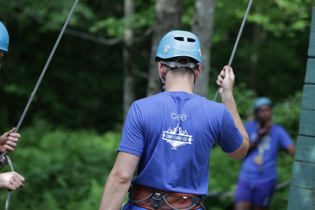 Camp counselor on the zipline course